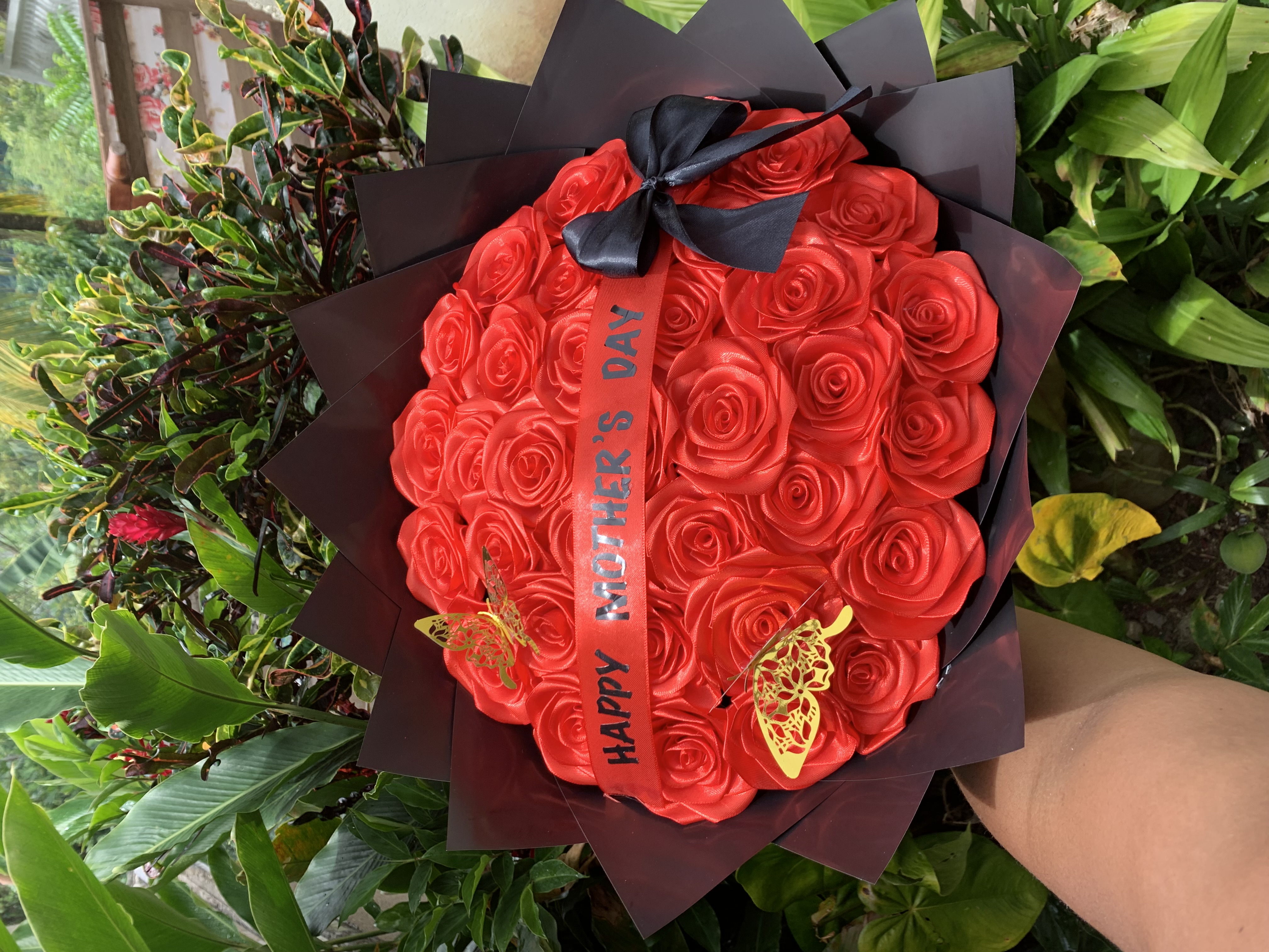 Handcrafted ribbon rose bouquet in Forever Florals' collection